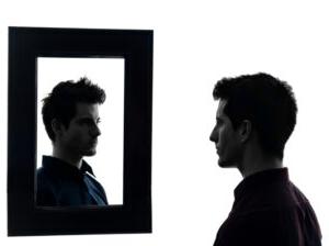 Man looking in a mirror